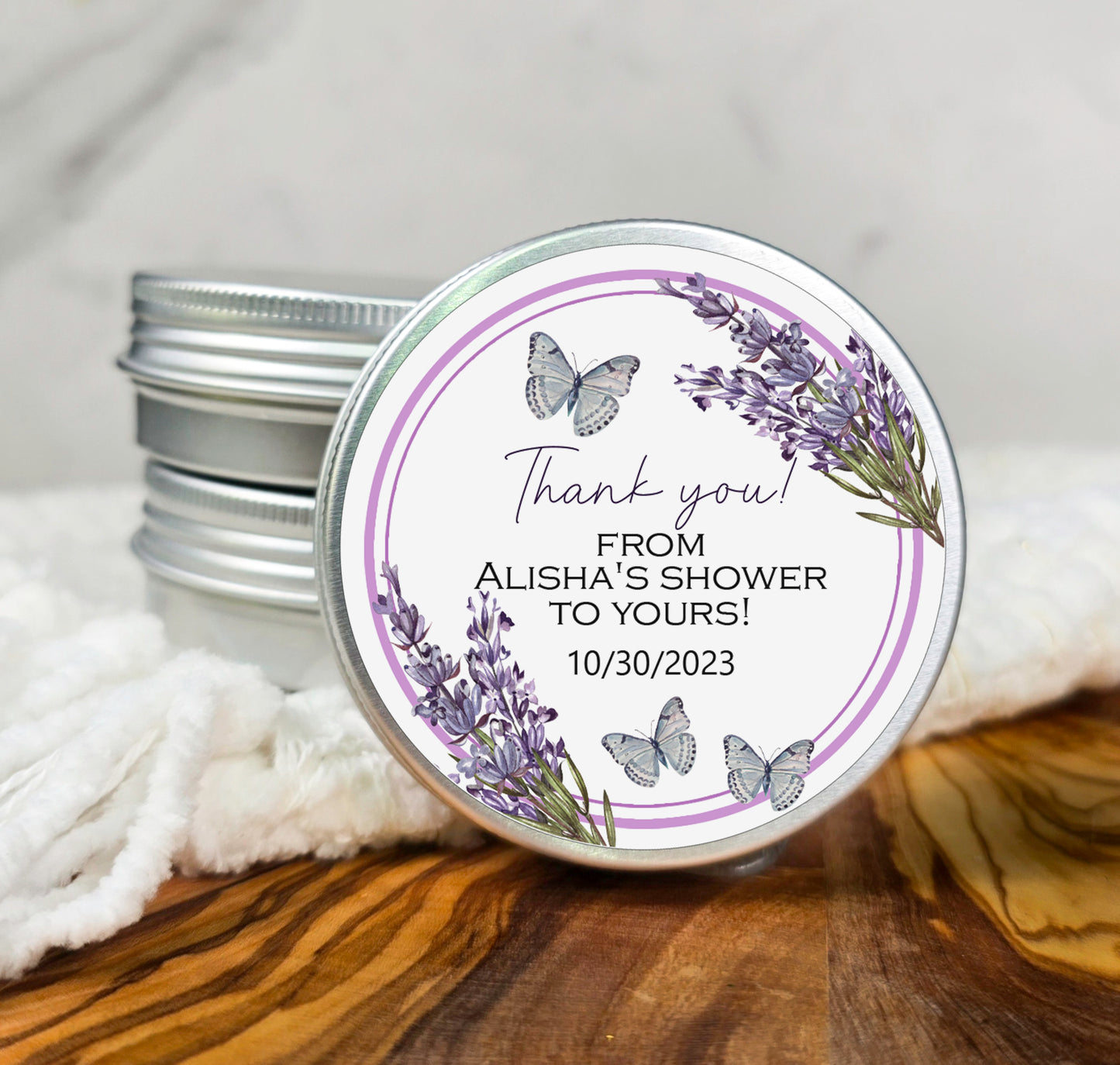 a jar of personalized wedding favors on a table