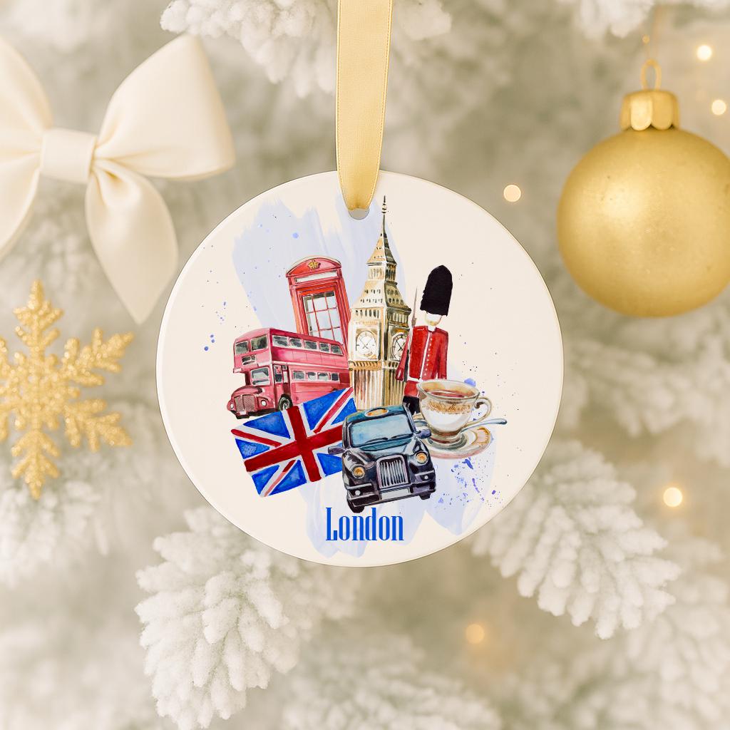 A circular ornament featuring various iconic landmarks and symbols of London, including Big Ben, the London Eye, and a red double-decker bus, along with a British flag and a cup of tea.