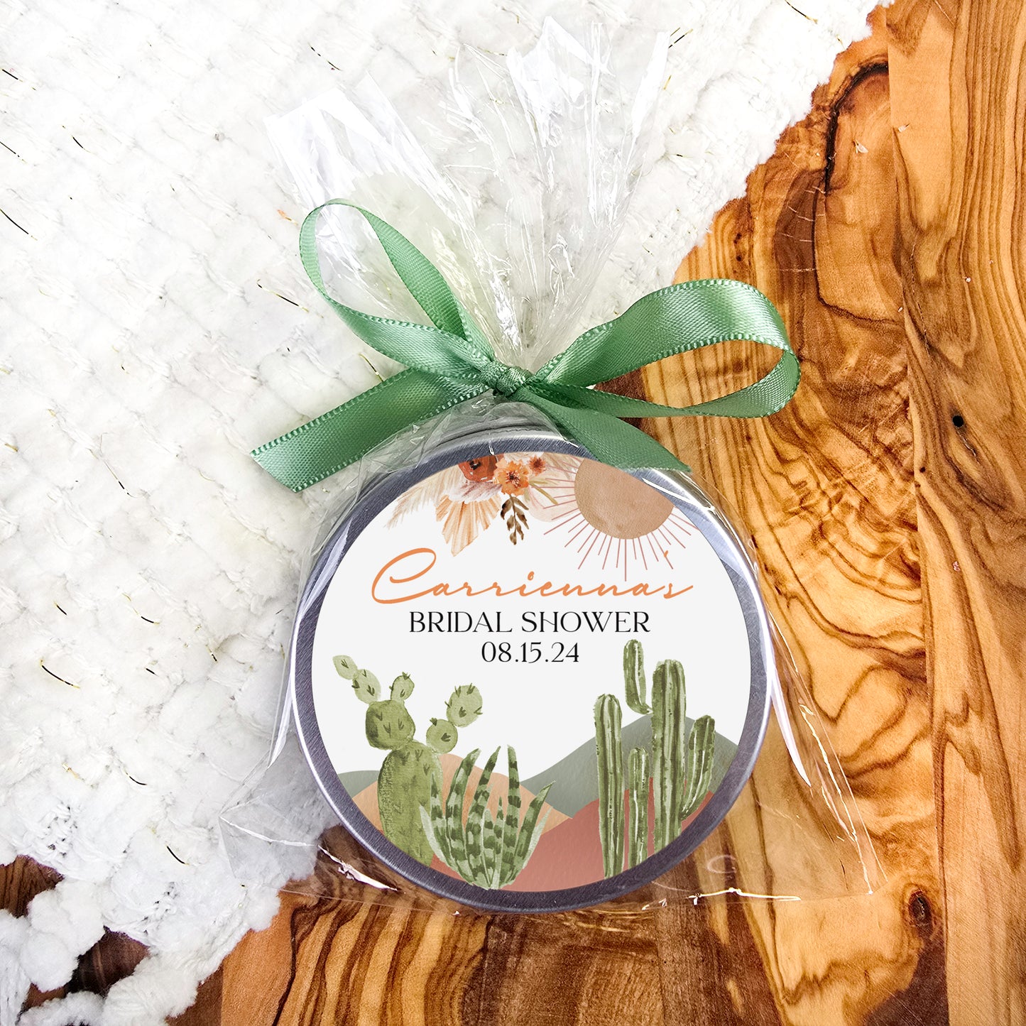 a jar of bridal shower soap sitting on a wooden surface