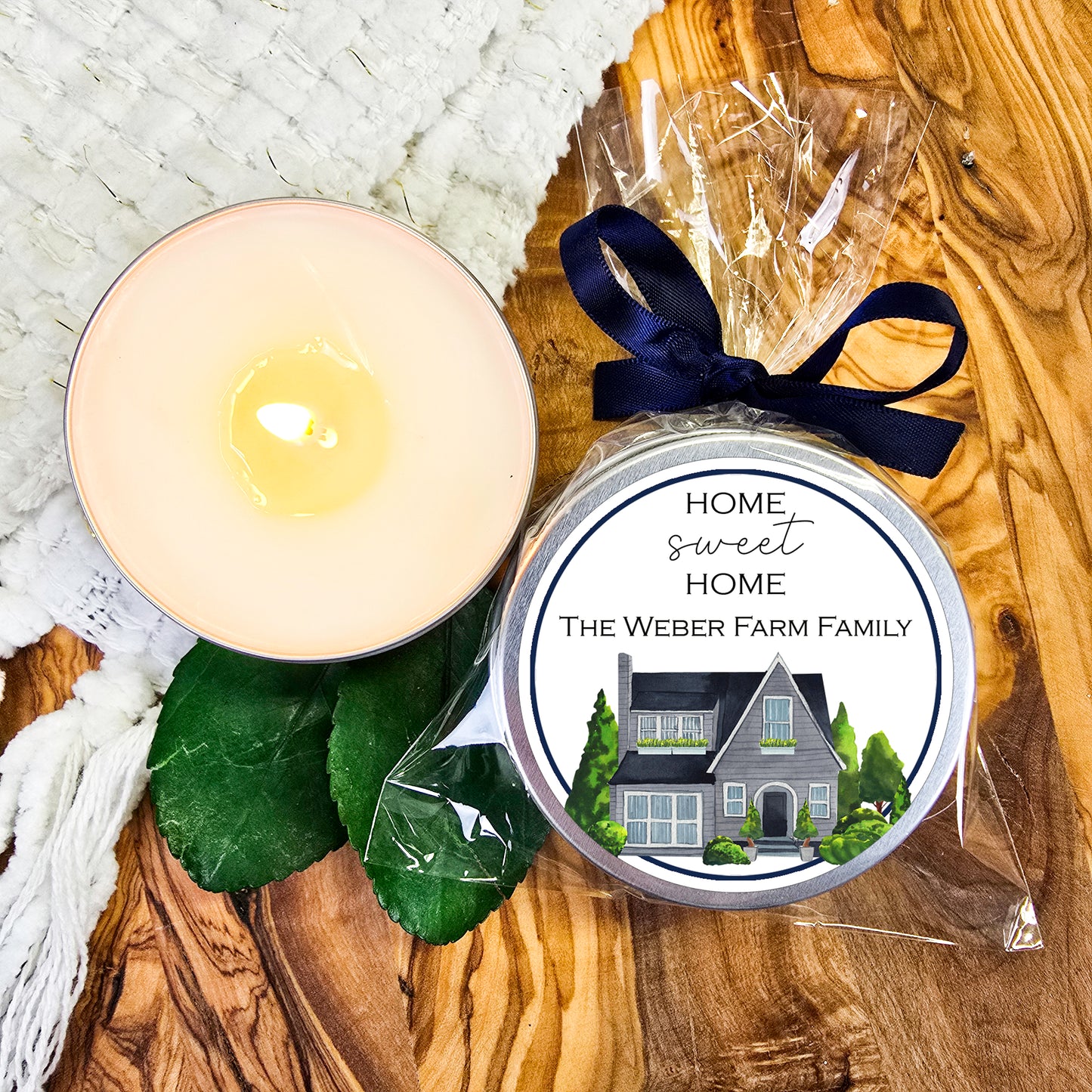 a candle and a candle holder on a wooden table