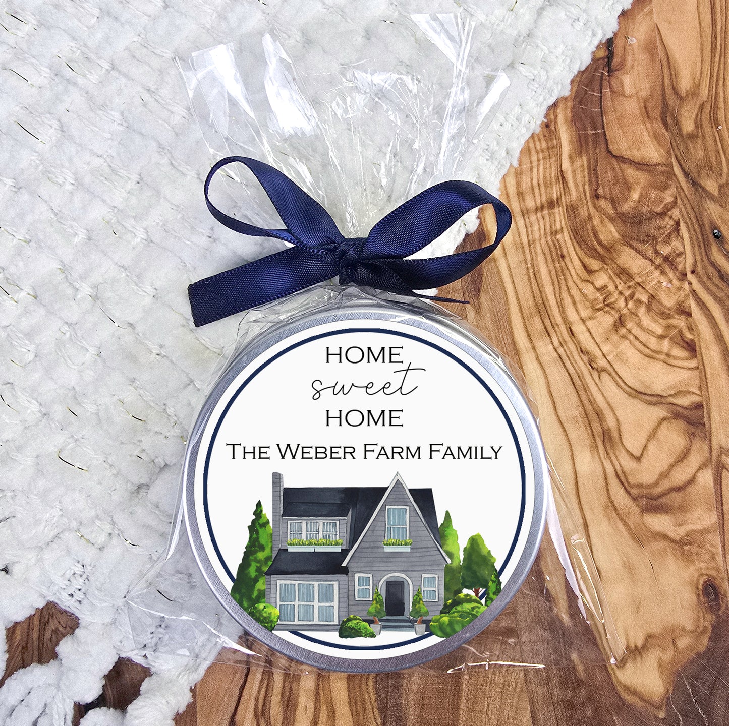 a home sweet home ornament with a ribbon