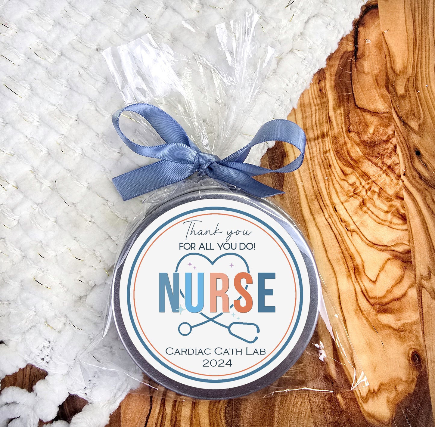 a jar of nurse's appreciation candle on a table