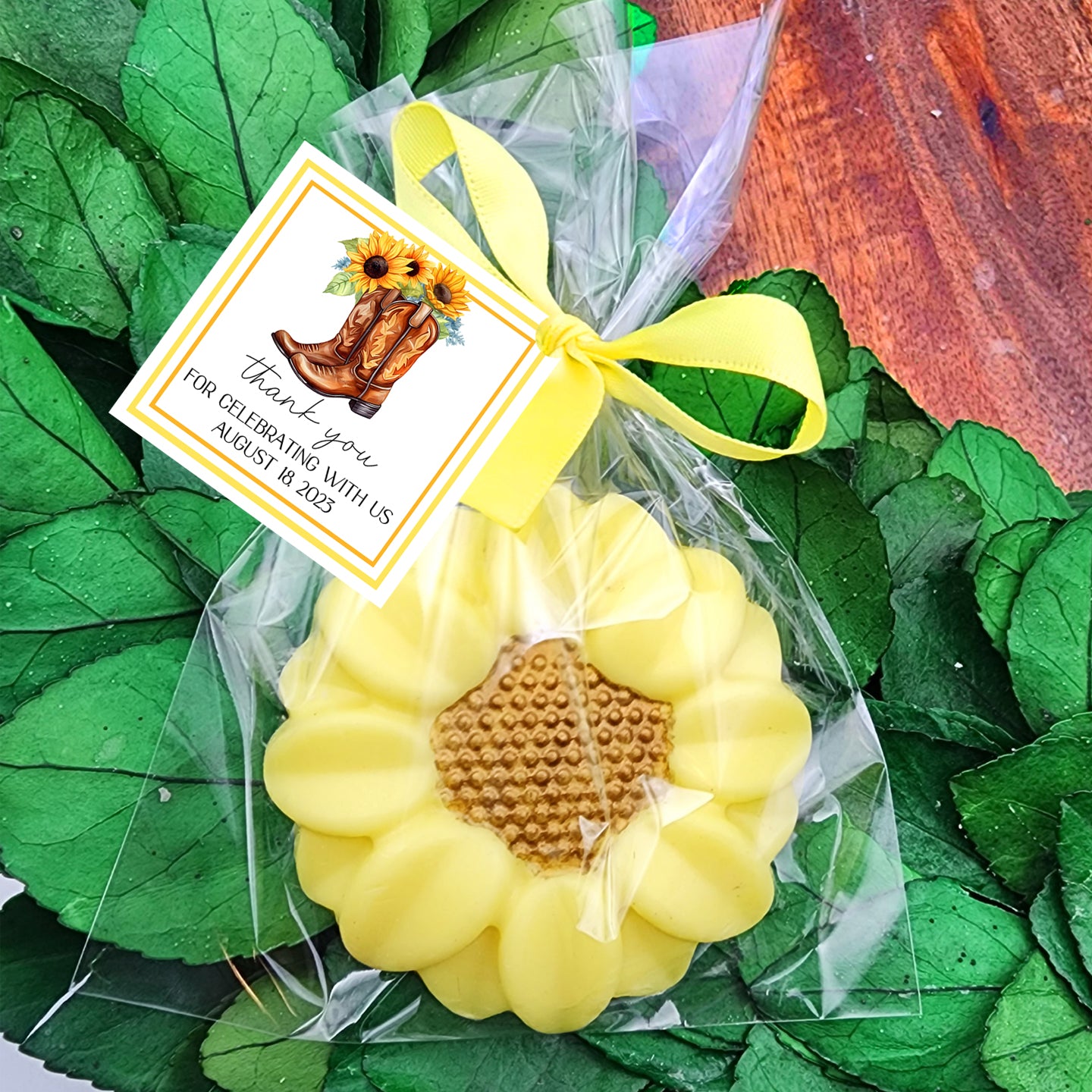 a yellow flower with a tag on it