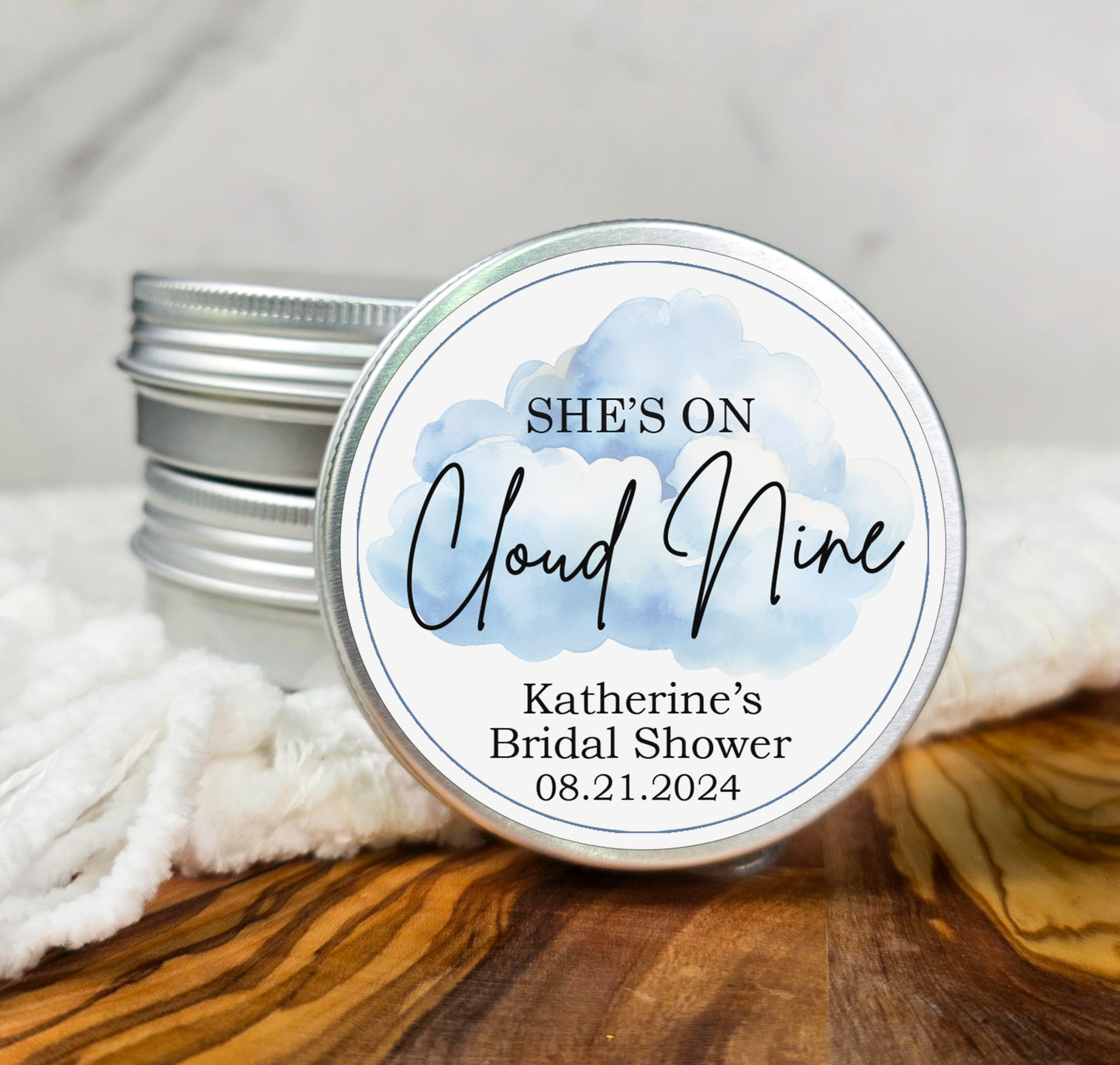 a jar of wedding favors sits on a table
