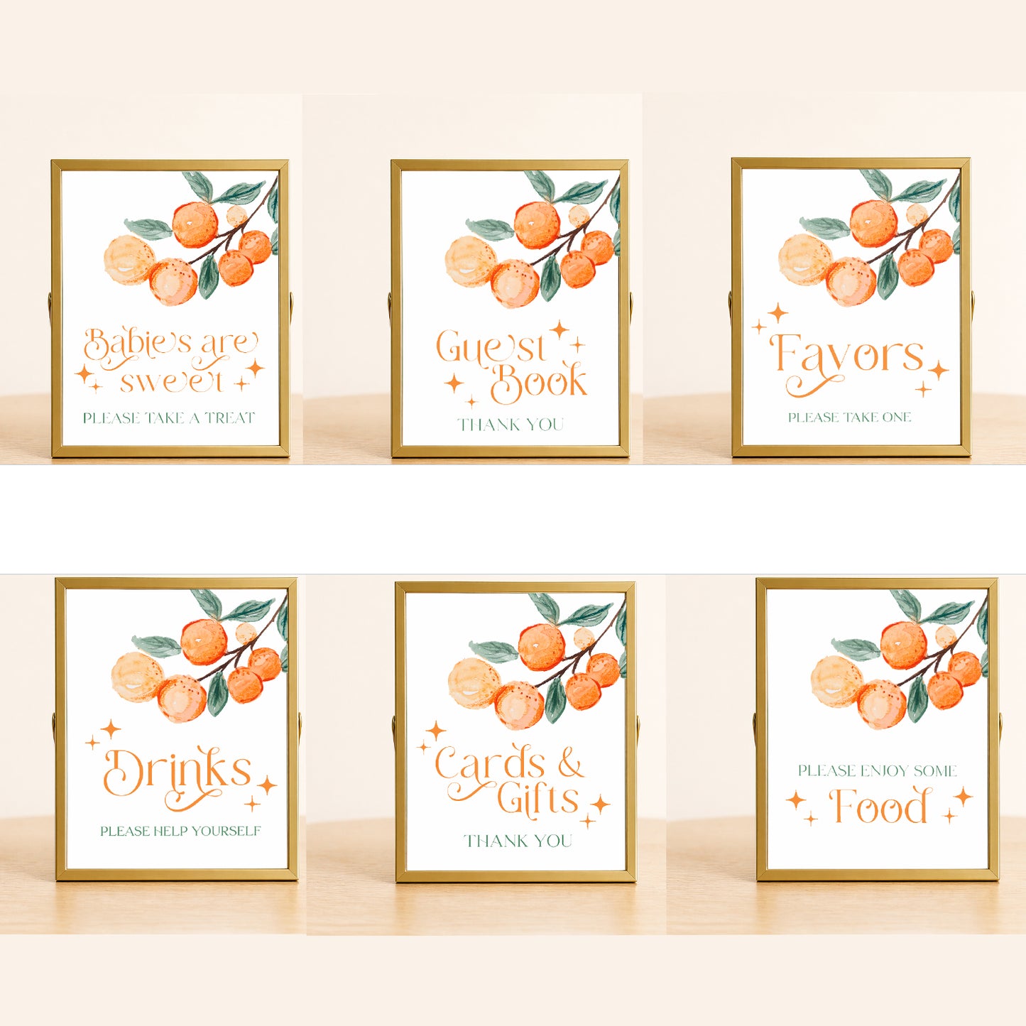 A Little Cutie baby shower sign set with citrus design including food, drinks, favors, and guest book signs displayed for coordinated party decor.
