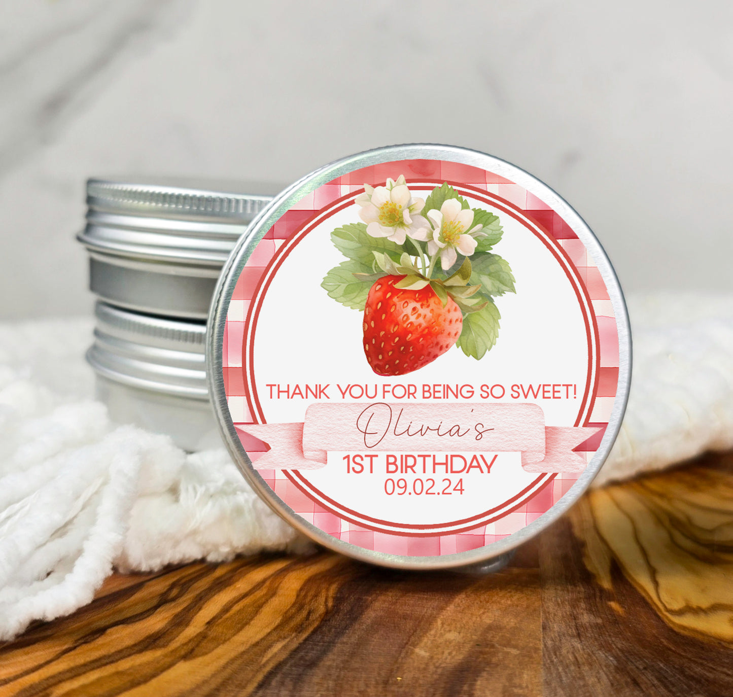 a personalized birthday candle tin with a strawberry on it