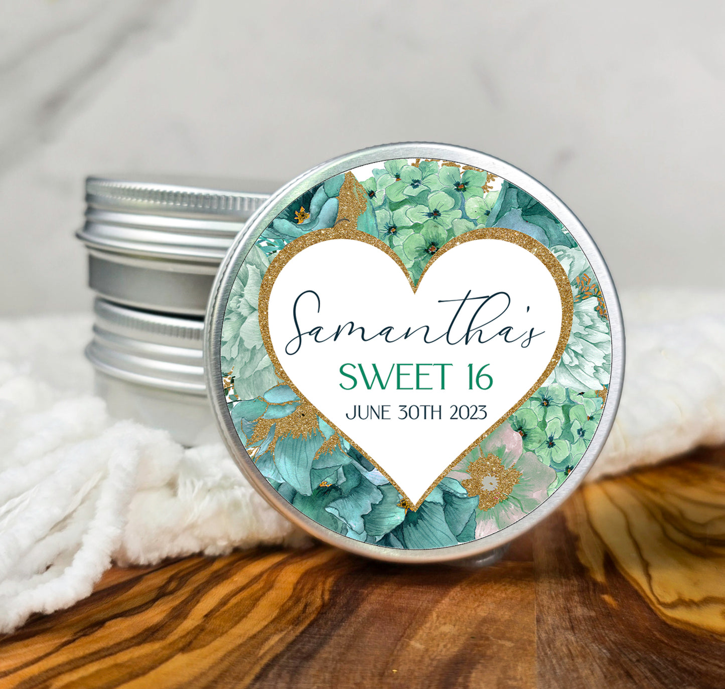 a jar of personalized wedding favors with a heart on it