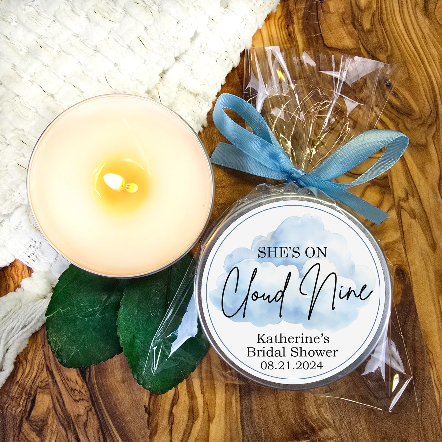 a candle and a jar of soap on a table