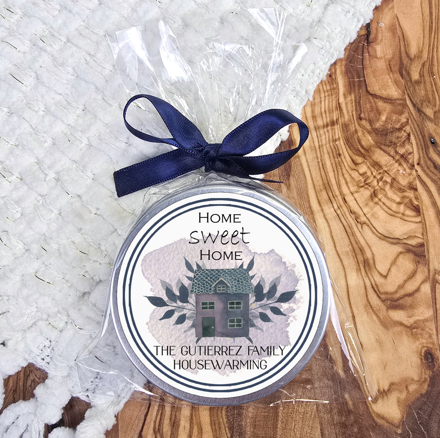 a small jar of soap sitting on top of a wooden table