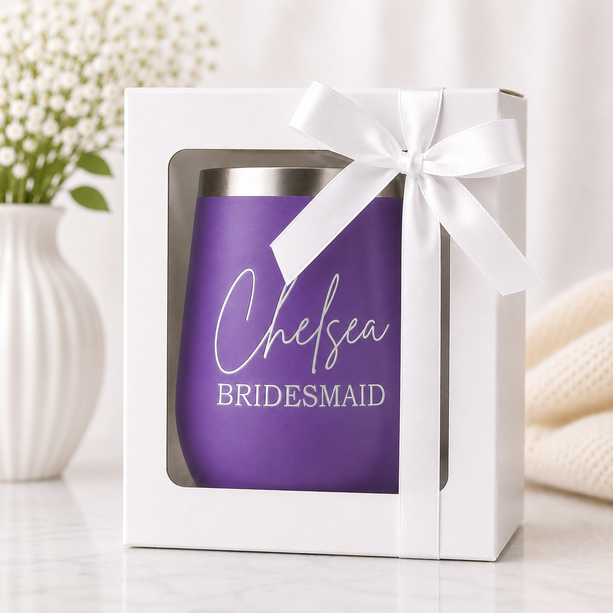 Personalized purple bridesmaid wine tumbler presented in a white gift box with a satin ribbon bow. Features a custom laser-engraved name and bridal party title, creating a thoughtful bridesmaid proposal gift, maid of honor gift, or wedding party keepsake.