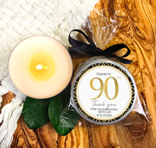 a candle and a package of 90th birthday candles