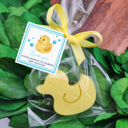 a rubber rubber ducky ornament with a yellow rubber rubber ducky on