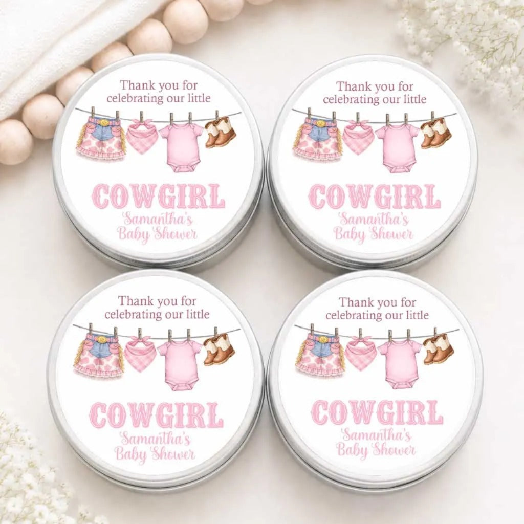 four round tin containers with a pink and white design, each containing a label with a baby shower theme. The labels include a cowgirl theme with baby clothes and accessories, and the text "Thank you for celebrating our little Samantha's Baby Shower".