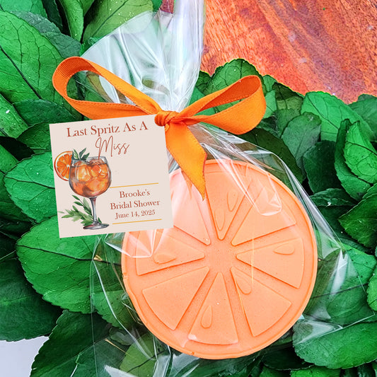 a soap bar sitting on top of a green leafy plant