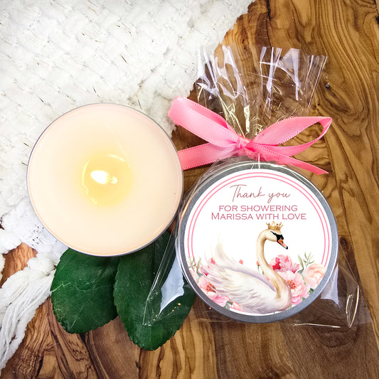 a candle and a candle holder on a table