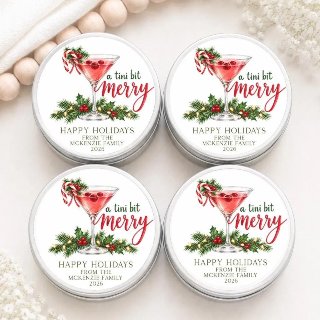 four circular tin labels with holiday-themed designs, including a martini glass with a cherry and holly leaves, and the text "a tini bit merry" and "Happy holidays from the McKenzie family 2020".