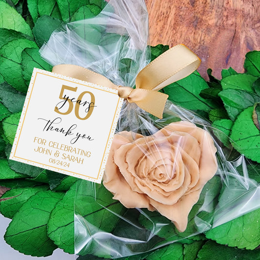 a gift wrapped in plastic and tied with a ribbon