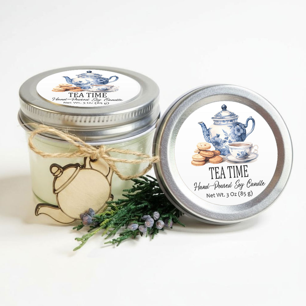 two mason jars with tea time-themed labels, placed on a white surface.