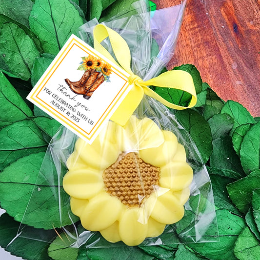 a yellow flower with a tag on it