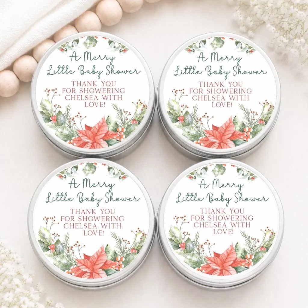 A group of four tin labels with a festive design, likely for a baby shower, with a message about Chelsea with love.