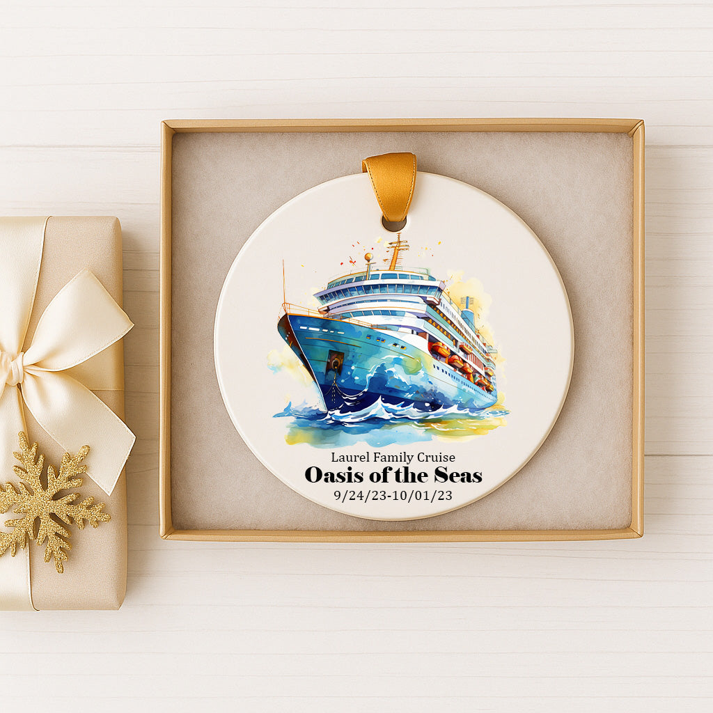 A ceramic ornament featuring a cruise ship, specifically the Oasis of the Seas, is displayed in a box.