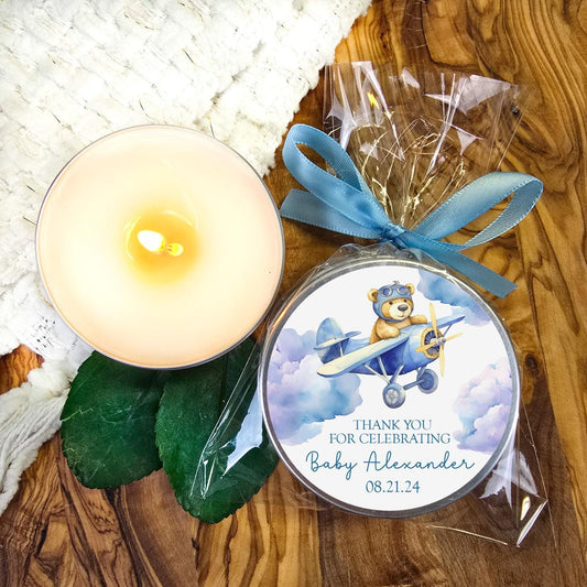 bear flying in an airplane candle favor