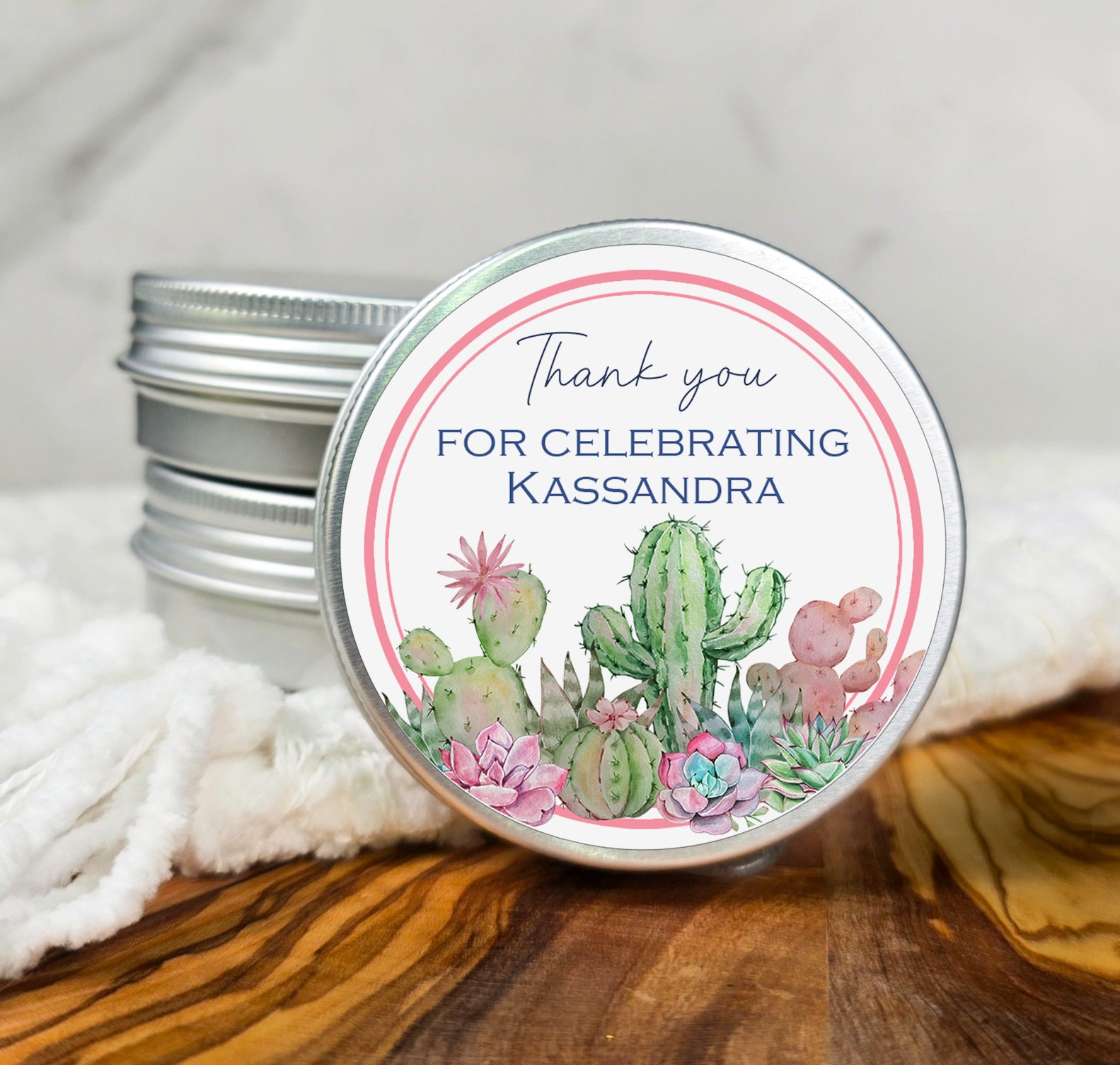 a jar of handmade candles with a thank you for celebrating kassandra label