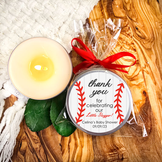 a candle with a baseball themed label on it