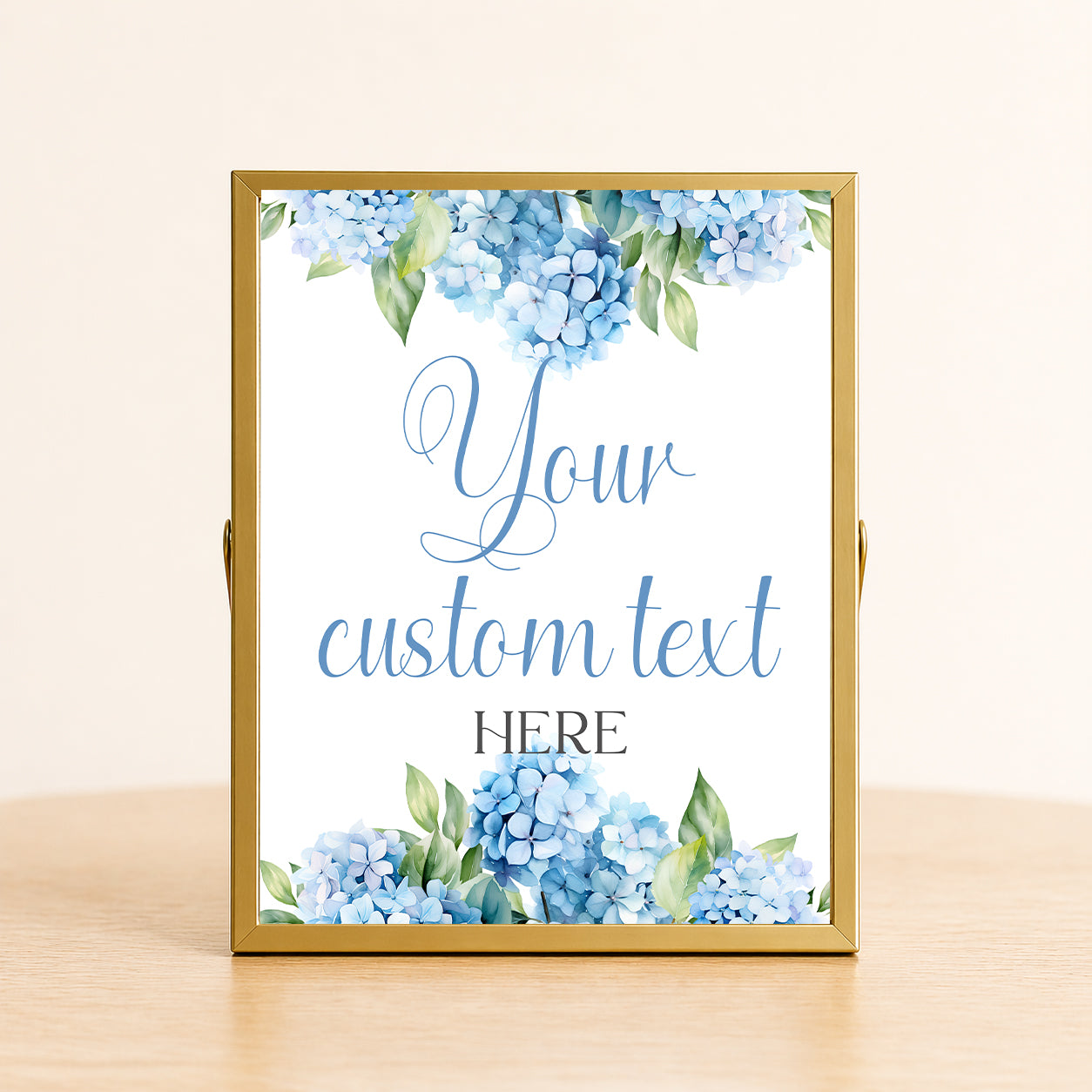 Elegant personalized hydrangea event sign with custom wording displayed in a gold frame for bridal showers, weddings, and garden party décor.