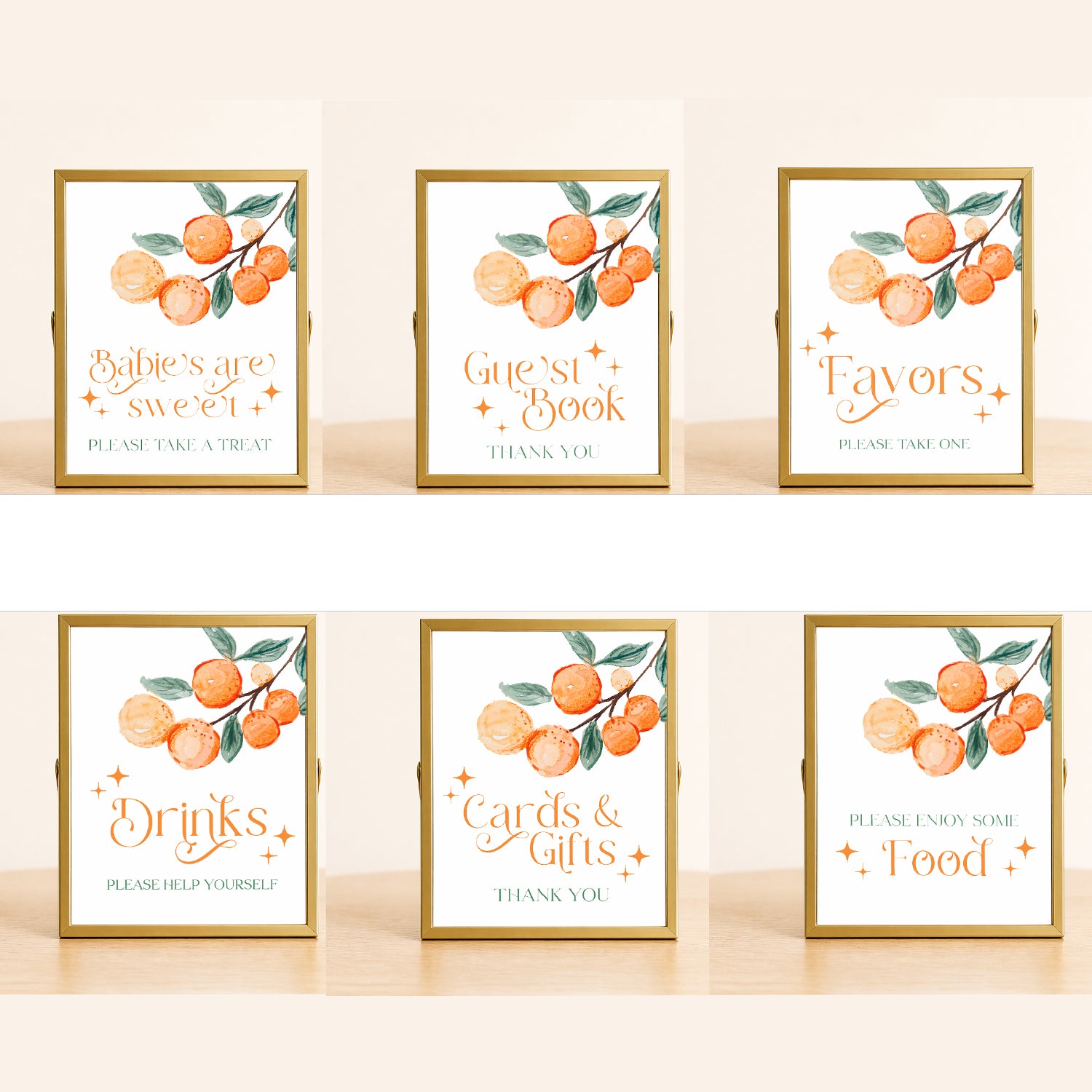 A Little Cutie baby shower sign set with citrus design including food, drinks, favors, and guest book signs displayed for coordinated party decor.