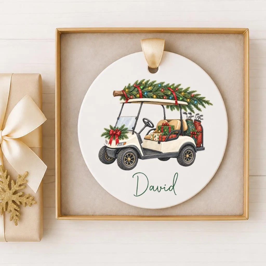 A ceramic ornament featuring a golf cart decorated with Christmas lights and a Christmas tree.