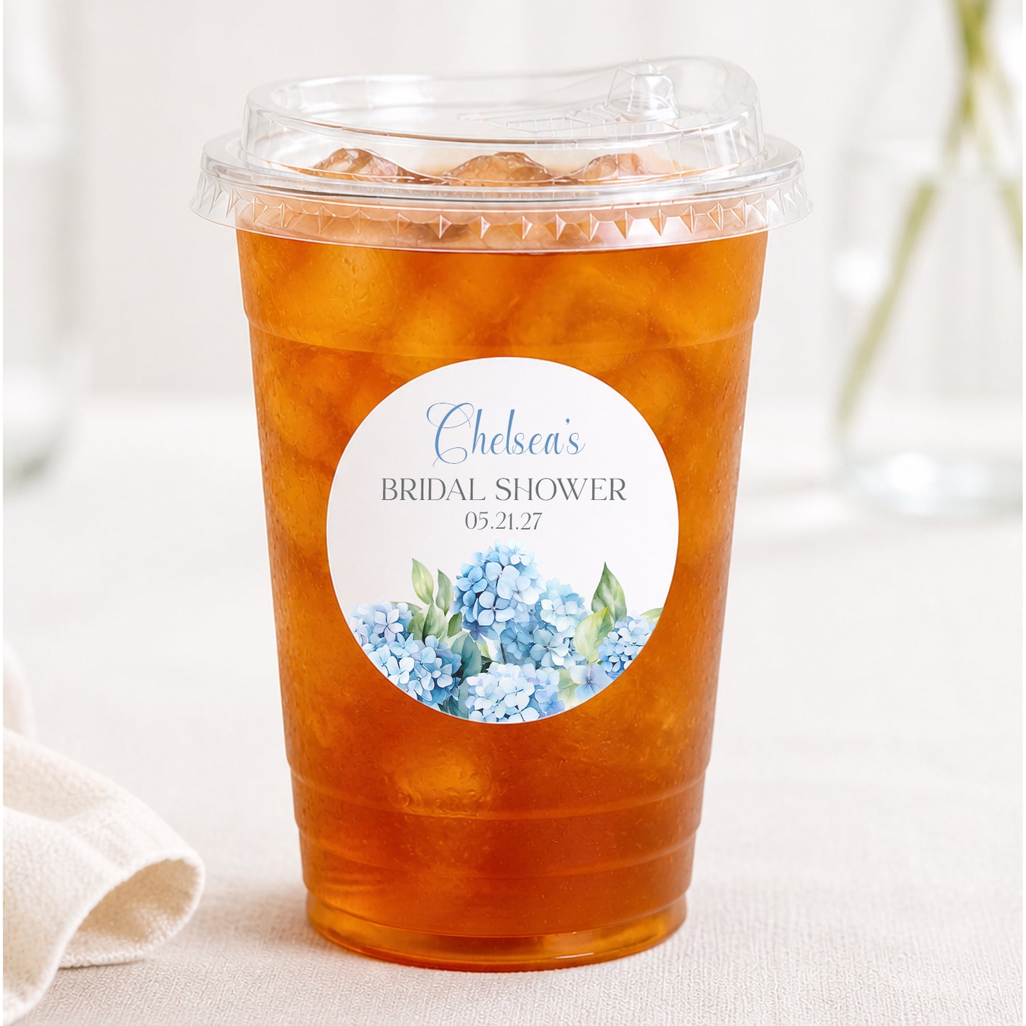 Personalized hydrangea drink cup kit with 12 cups, lids, and waterproof stickers. Ideal for bridal showers and elegant events.