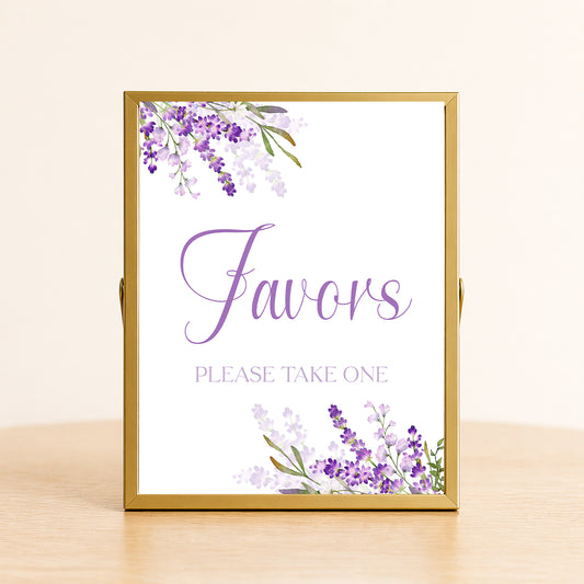 Lavender favors sign with purple floral design displayed on table for bridal shower or wedding favor station decor.