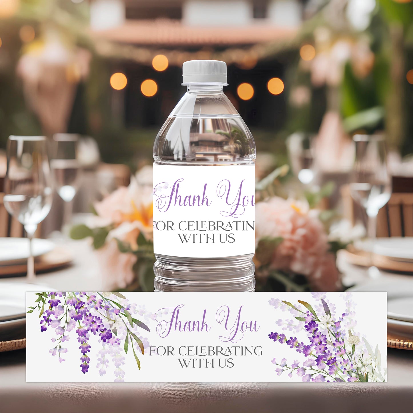 Lavender water bottle labels with purple floral design applied to bottles for bridal shower or wedding drink station decor.