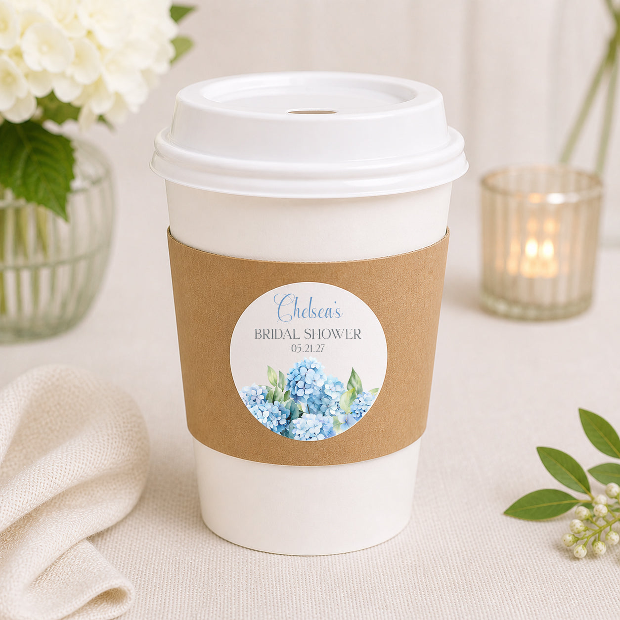 Personalized hydrangea bridal shower coffee cup with sleeve and custom round sticker