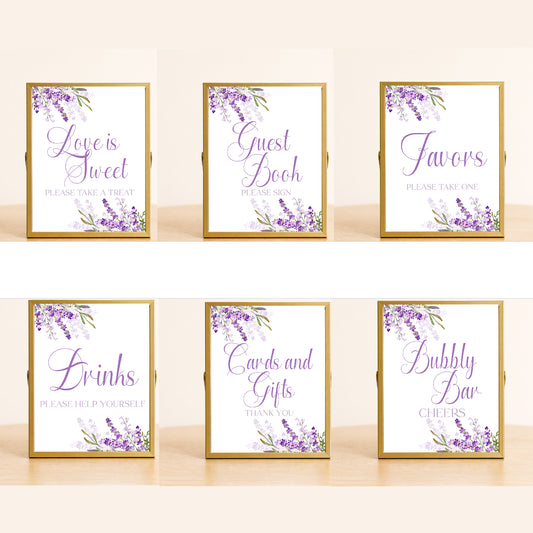 Lavender wedding sign set with six purple floral signs including guest book, favors, drinks, bubbly bar, cards and gifts, and dessert table decor for bridal shower or wedding.