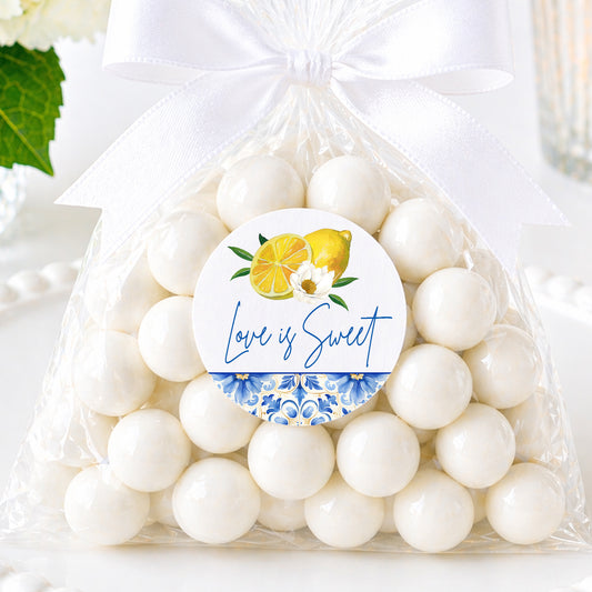 Amalfi Coast love is sweet stickers with lemon design on favor bag, Mediterranean wedding favor labels with blue tile pattern