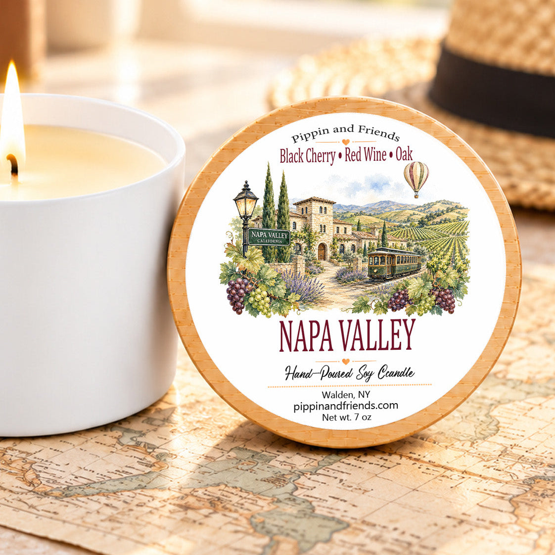 Napa Valley destination soy candle with black cherry, red wine and oak fragrance in 7 oz white tin with wood-look lid.