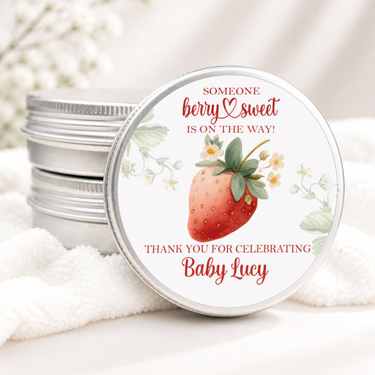 Personalized berry sweet baby shower candle favor in a silver tin featuring a watercolor strawberry, delicate blossoms, and custom baby shower details, displayed on a soft white background.