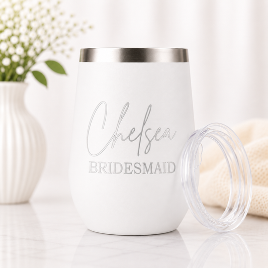 Personalized white insulated wine tumbler with a custom laser-engraved name and bridal party title. Features a stainless steel rim, clear lid, and double-wall insulation, making it a timeless bridal party gift, bridesmaid proposal gift, or wedding day keepsake.